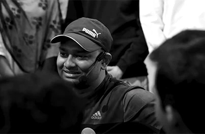 Speaker smiling during an interactive session